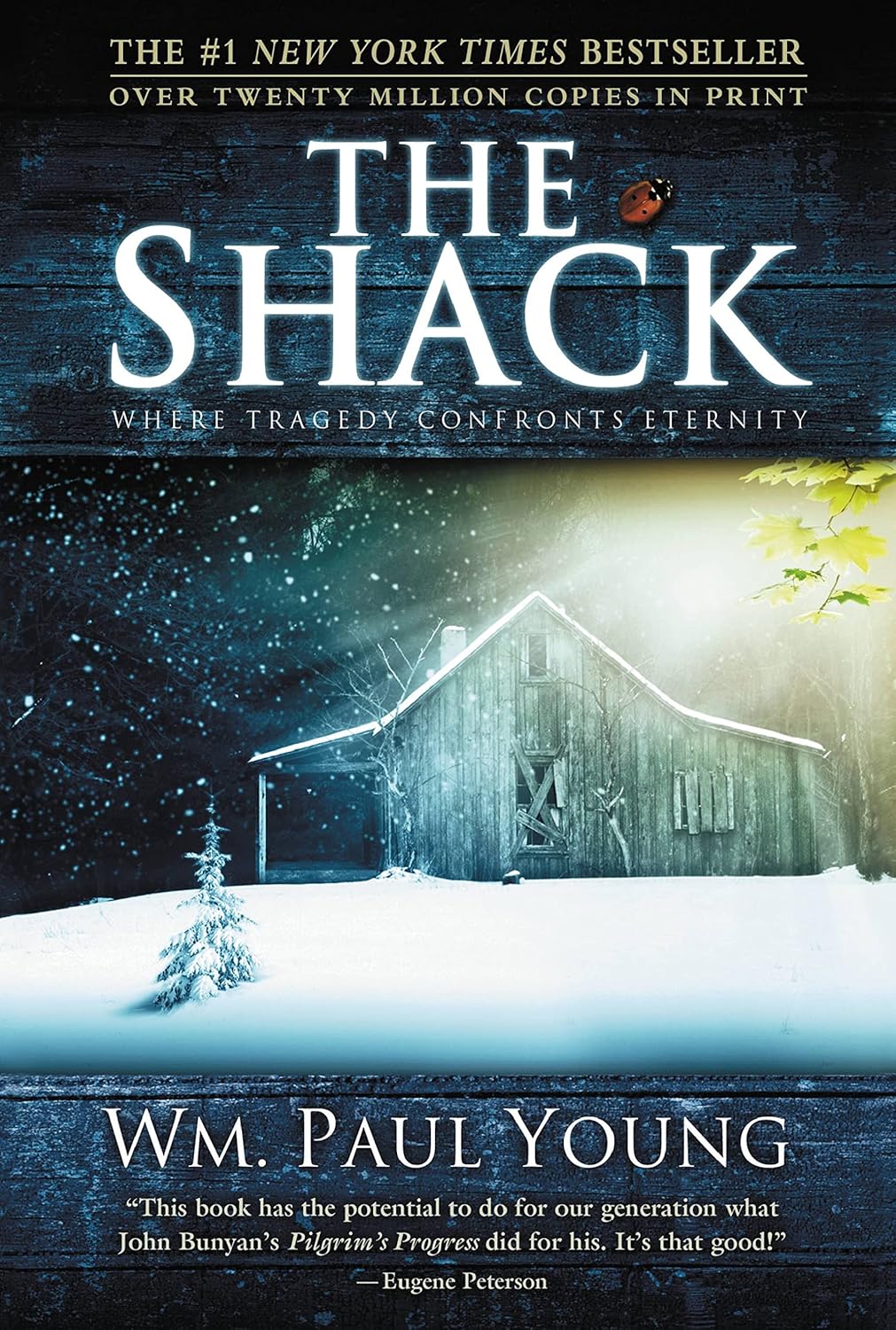 Front cover of the novel The Shack by William P. Young, showing a lonely wooden shack in a snowy winter landscape transforming into a bright spring environment.