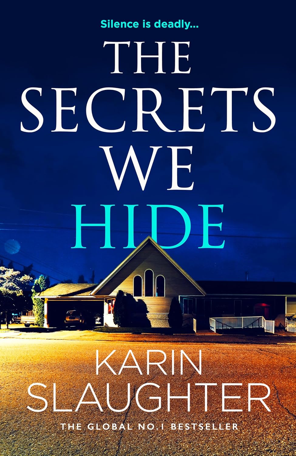A dark, moody cover of Karin Slaughter's crime thriller novel The Secrets We Hide placed on a rustic wooden table next to a magnifying glass.